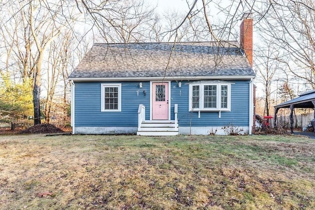 view of front of home with a front lawn