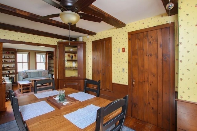 310 S River Rd, Charlemont, MA 01339 - dining space with beamed ceiling, a ceiling fan, and wallpapered walls