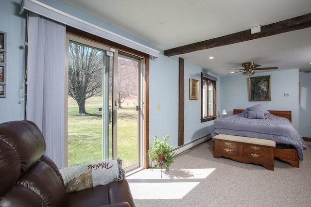 310 S River Rd, Charlemont, MA 01339 - bedroom featuring beamed ceiling, a baseboard heating unit, multiple windows, and light carpet