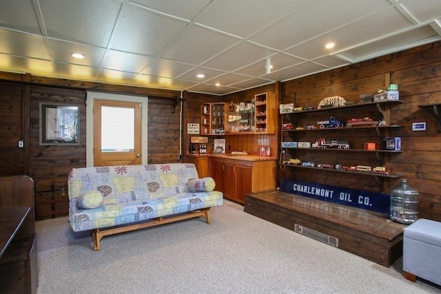 310 S River Rd, Charlemont, MA 01339 - living room with wooden walls, recessed lighting, and carpet flooring