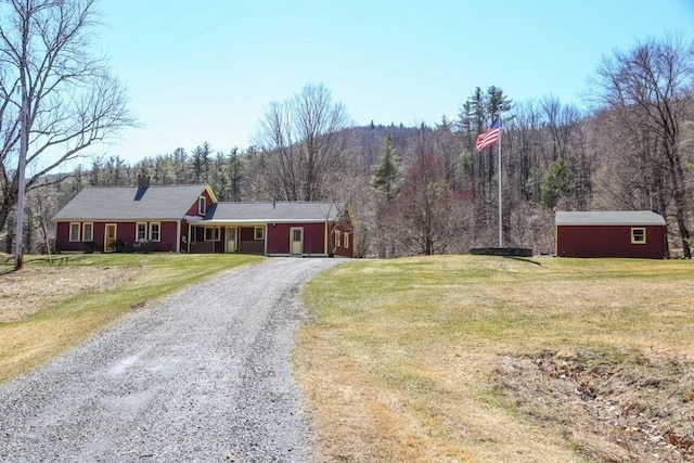 310 S River Rd, Charlemont, MA 01339 - ranch-style home featuring a wooded view, a front lawn, and driveway