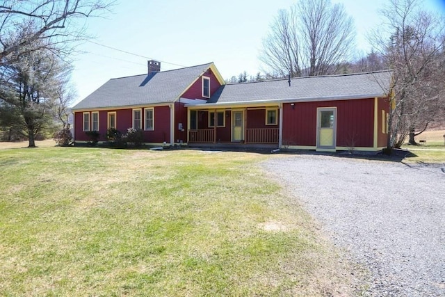 310 S River Rd, Charlemont, MA 01339 - ranch-style house featuring a front yard, covered porch, and a chimney
