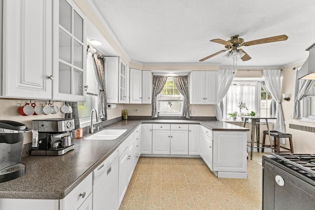 51 Gifford St, Brockton, MA 02301 - kitchen featuring a sink, white dishwasher, ceiling fan, black range with gas stovetop, and dark countertops