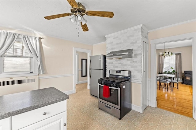 51 Gifford St, Brockton, MA 02301 - kitchen with stainless steel appliances, wall chimney range hood, ornamental molding, a chandelier, and a ceiling fan