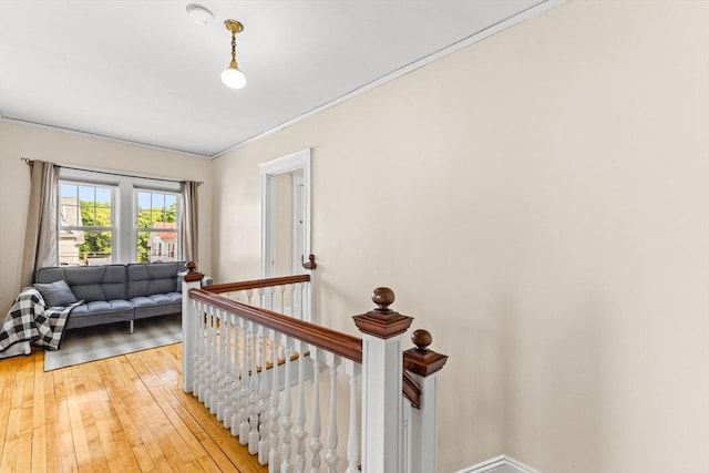 51 Gifford St, Brockton, MA 02301 - corridor featuring an upstairs landing, light wood-type flooring, ornamental molding, and baseboards