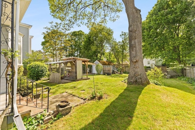 51 Gifford St, Brockton, MA 02301 - view of yard featuring a fire pit and an outbuilding