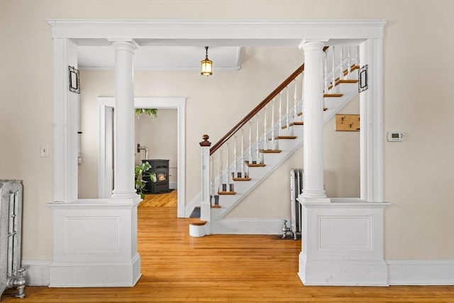 51 Gifford St, Brockton, MA 02301 - foyer with radiator heating unit, wood finished floors, and stairs