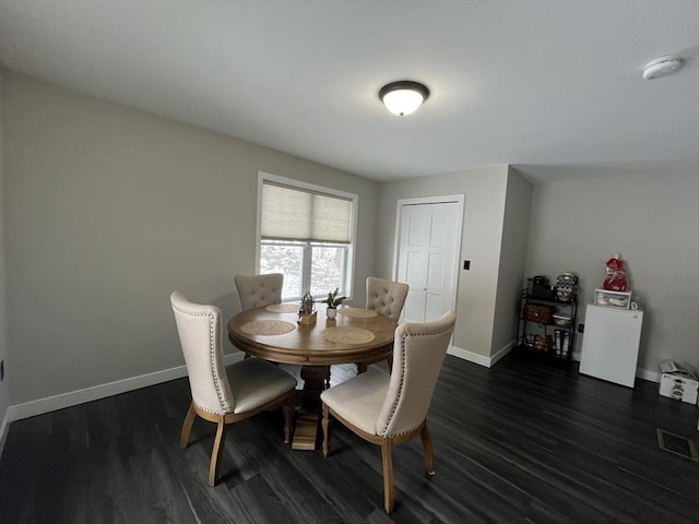 445 Cambridge St Unit 445, Worcester, MA 01610 - dining area with dark wood-style floors and baseboards