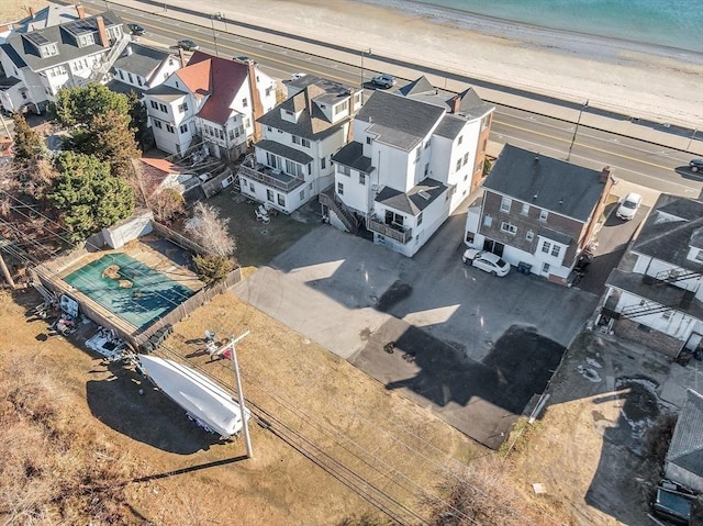 bird's eye view with a water view and a view of the beach