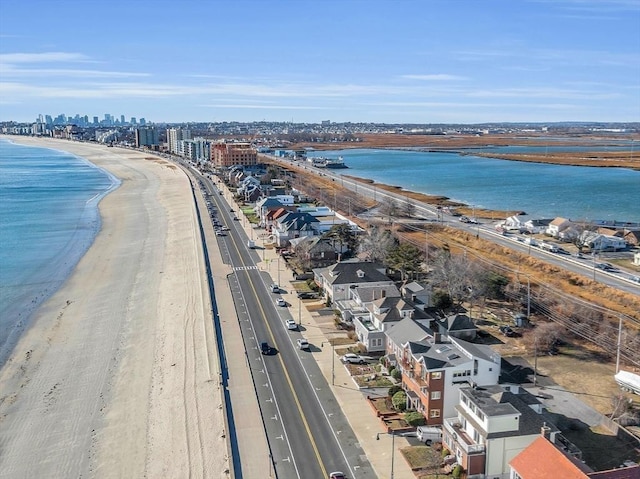 bird's eye view with a view of the beach and a water view