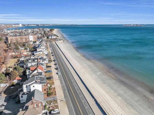 aerial view with a view of the beach and a water view