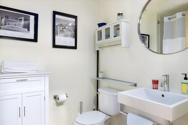 156 Porter St Unit 434, Boston, MA 02128 - bathroom featuring a sink and a shower with curtain