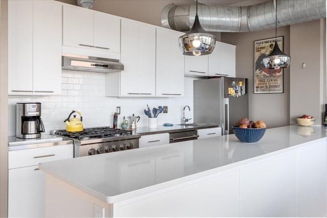 156 Porter St Unit 434, Boston, MA 02128 - kitchen featuring ventilation hood, appliances with stainless steel finishes, tasteful backsplash, white cabinets, and hanging light fixtures