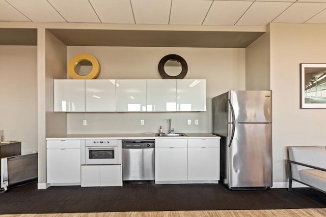156 Porter St Unit 434, Boston, MA 02128 - kitchen featuring stainless steel appliances, white cabinetry, light countertops, and modern cabinets