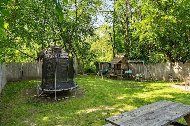 24 Springwell Rd, Billerica, MA 01821 - fenced backyard featuring a trampoline and a playground