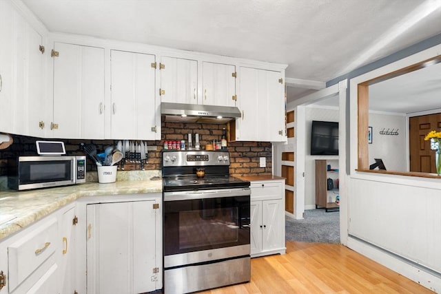 24 Springwell Rd, Billerica, MA 01821 - kitchen featuring stainless steel appliances, under cabinet range hood, white cabinets, light wood finished floors, and light countertops