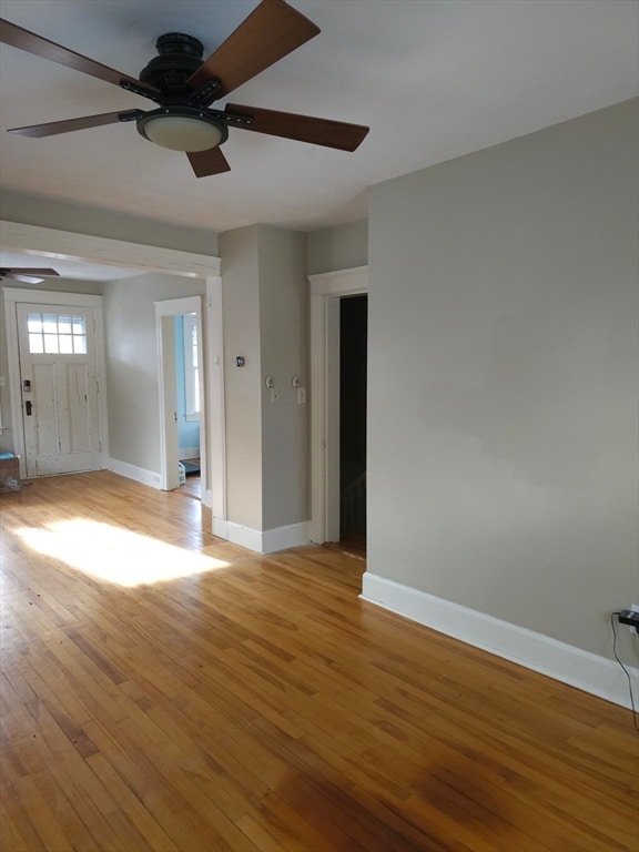 interior space featuring ceiling fan and light wood-type flooring