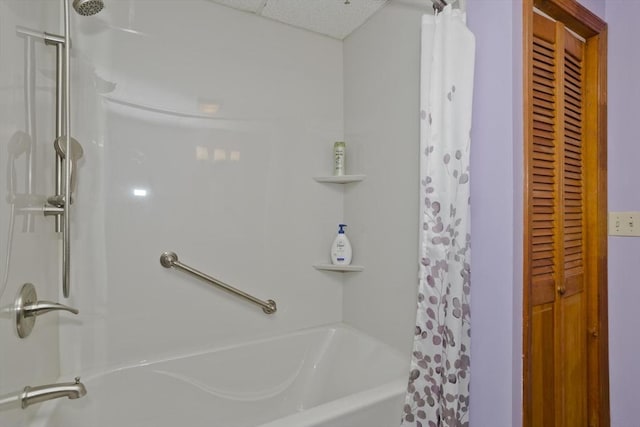 bathroom featuring shower / tub combo with curtain