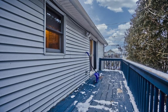 view of property exterior featuring a deck