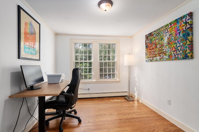 home office with baseboards, ornamental molding, light wood-style flooring, and a baseboard heating unit