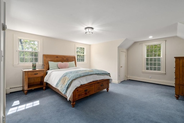 bedroom with a baseboard heating unit, multiple windows, carpet, and a baseboard radiator