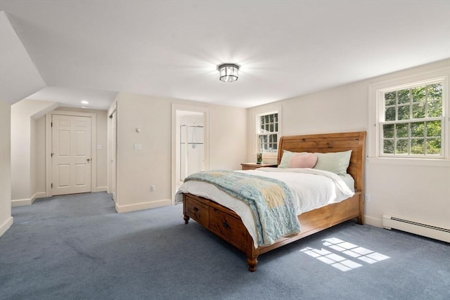 bedroom featuring baseboards, carpet, and a baseboard radiator