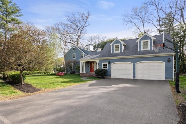 cape cod home with roof with shingles, an attached garage, driveway, and a front yard