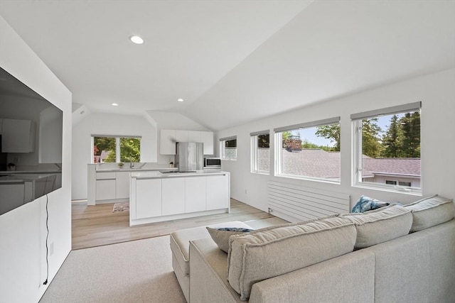 481 W Townsend Rd, Lunenburg, MA 01462 - living room with lofted ceiling, recessed lighting, and light wood-type flooring