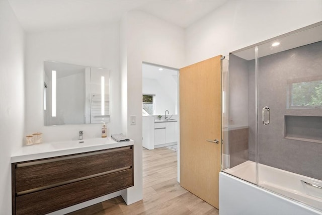 481 W Townsend Rd, Lunenburg, MA 01462 - full bath with vanity, wood finished floors, and combined bath / shower with glass door