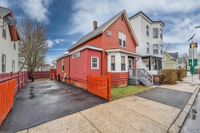 50 Walnut St, Lynn, MA 01905 - view of front of home with a chimney and a residential view
