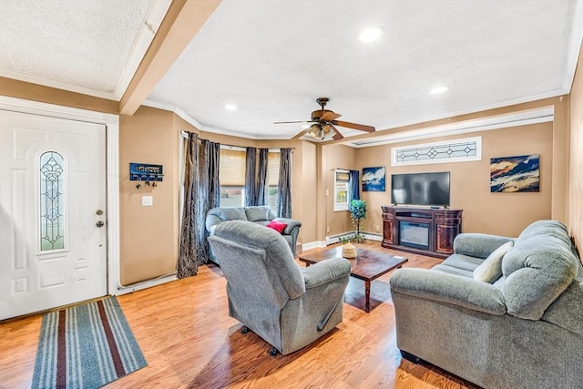 50 Walnut St, Lynn, MA 01905 - living area featuring crown molding, light wood-style floors, ceiling fan, recessed lighting, and baseboards