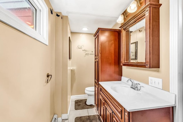 50 Walnut St, Lynn, MA 01905 - bathroom featuring toilet, vanity, tile patterned floors, and baseboards