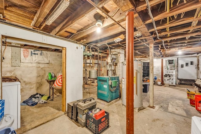 50 Walnut St, Lynn, MA 01905 - unfinished basement featuring water heater, a heating unit, and washer / dryer
