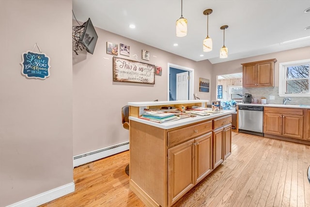 50 Walnut St, Lynn, MA 01905 - kitchen featuring dishwasher, a baseboard heating unit, light wood-style flooring, light countertops, and recessed lighting