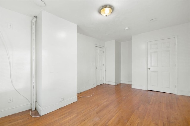 36 Brookford St, Boston, MA 02125 - empty room featuring light wood-style flooring and baseboards