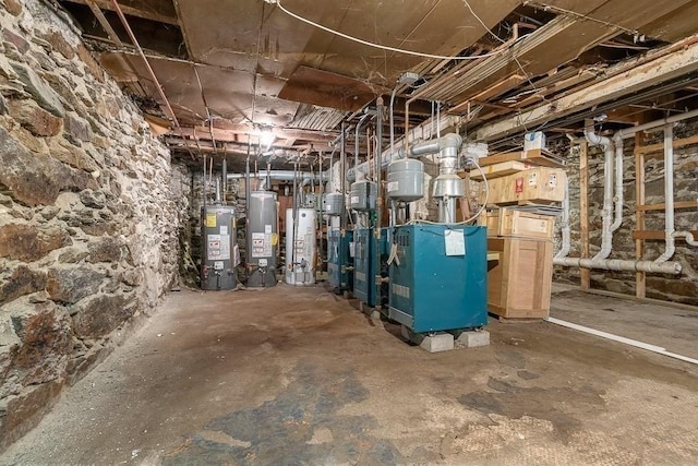 36 Brookford St, Boston, MA 02125 - unfinished basement featuring water heater and a heating unit