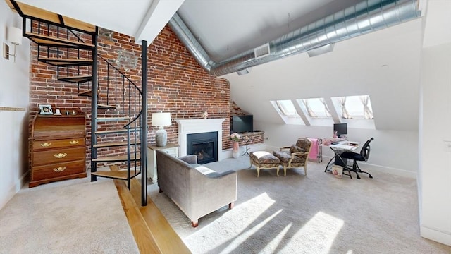 52 Sanborn St Unit 408, Reading, MA 01867 - carpeted living room with a glass covered fireplace, vaulted ceiling with beams, baseboards, and brick wall