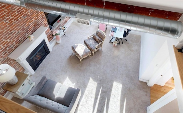 52 Sanborn St Unit 408, Reading, MA 01867 - living room featuring a glass covered fireplace