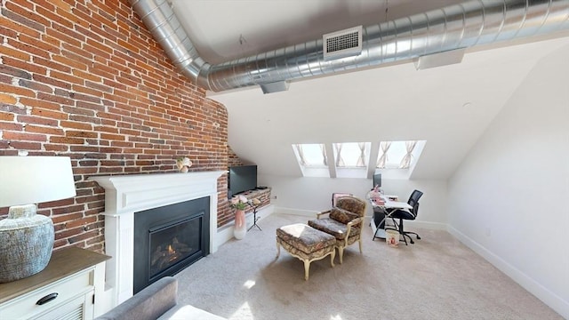 52 Sanborn St Unit 408, Reading, MA 01867 - sitting room with a glass covered fireplace, carpet floors, visible vents, and baseboards