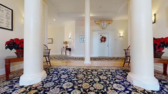 52 Sanborn St Unit 408, Reading, MA 01867 - entrance foyer with decorative columns and wood finished floors