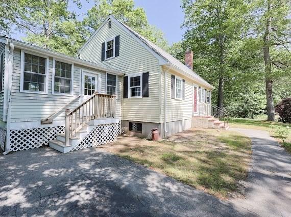 230 2nd St, Stoughton, MA 02072 - view of front of home featuring a chimney