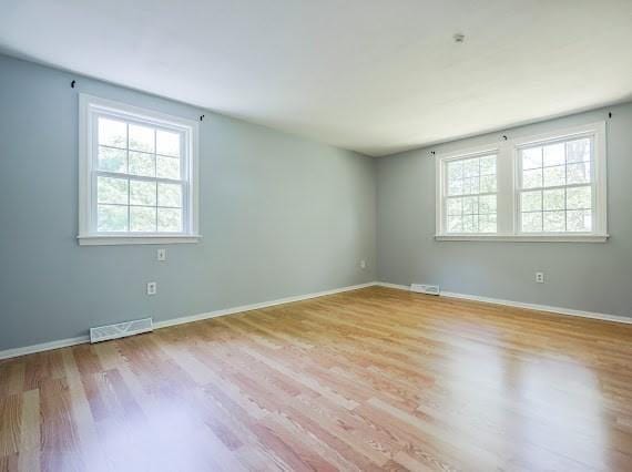 230 2nd St, Stoughton, MA 02072 - spare room with light wood-style floors and baseboards