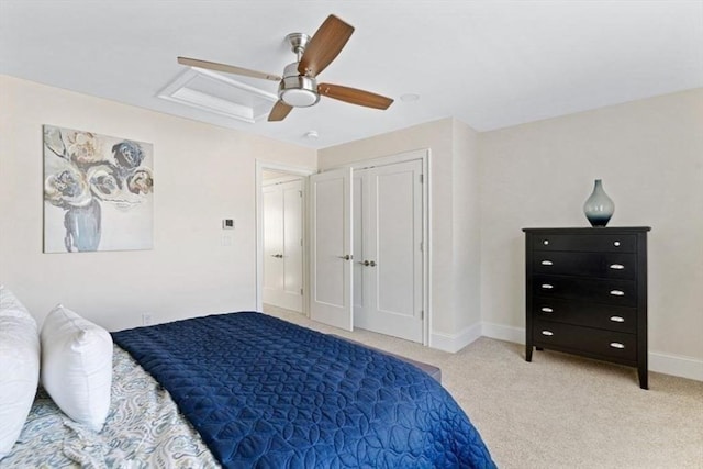 carpeted bedroom featuring ceiling fan