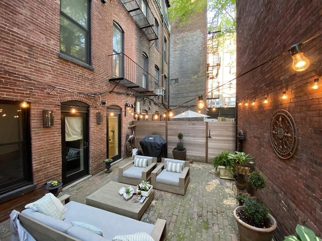 view of patio / terrace with a grill and an outdoor living space