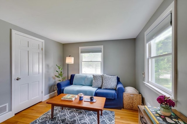 477 Laws Brook Rd, Concord, MA 01742 - living area with light wood-style floors and baseboards