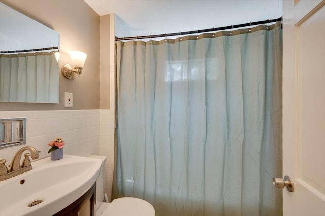 477 Laws Brook Rd, Concord, MA 01742 - full bath featuring tile walls, vanity, toilet, a shower with shower curtain, and a wainscoted wall