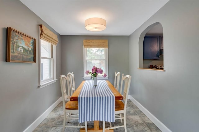 477 Laws Brook Rd, Concord, MA 01742 - dining space featuring baseboards and arched walkways
