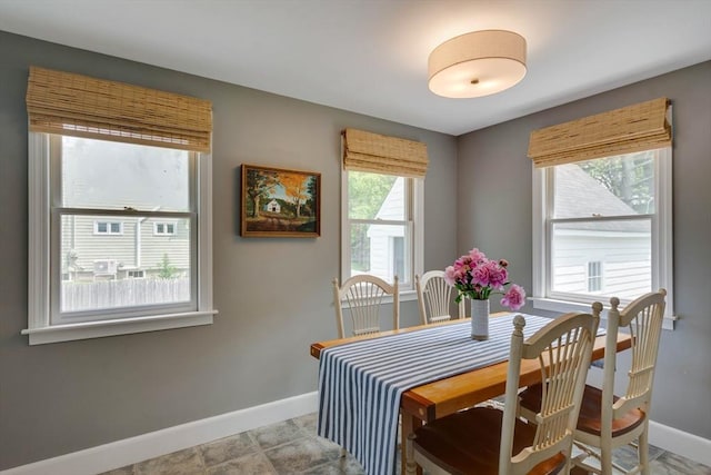 477 Laws Brook Rd, Concord, MA 01742 - dining room featuring baseboards