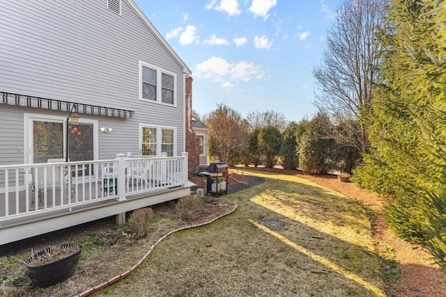 view of yard with a deck