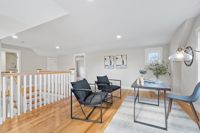 office area with light hardwood / wood-style floors